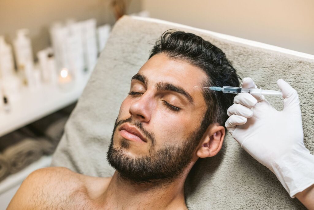 man receiving botox treatment in forehead at med spa in queen creek arizona